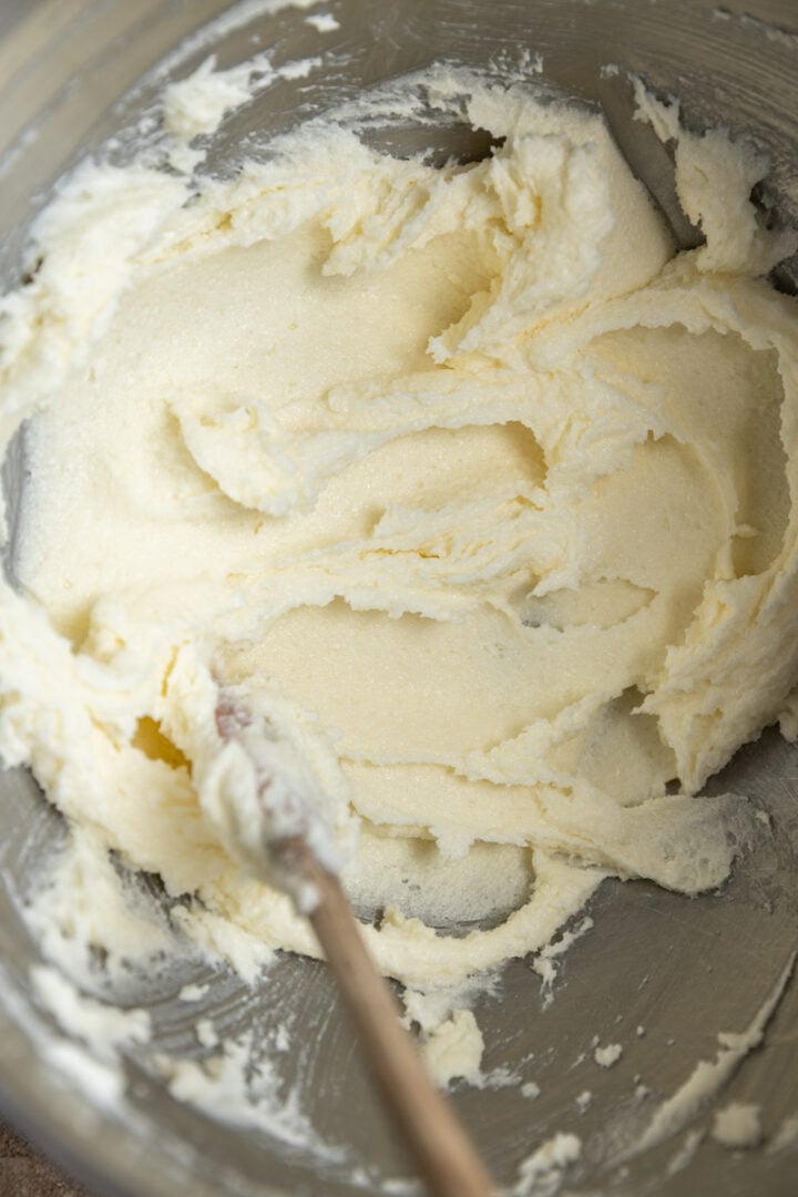 Lightly creamed butter and sugar in a bowl.