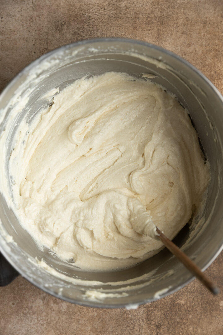 Cake batter for a butter cake in a mixing bowl. 