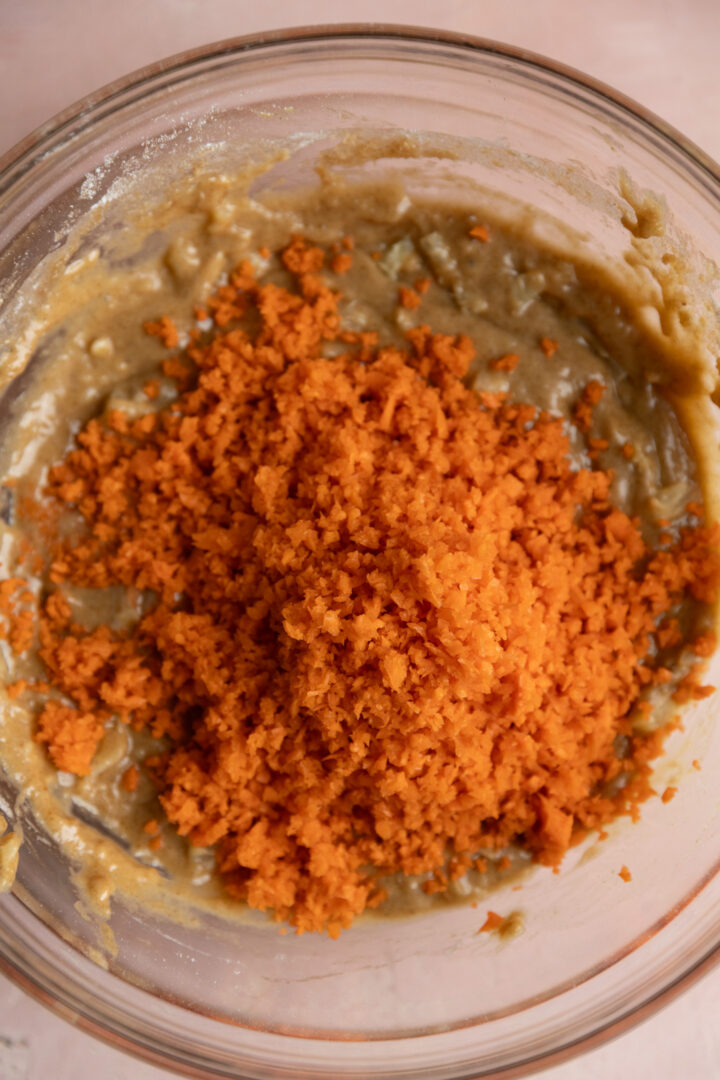 Shredded carrots added to the batter.