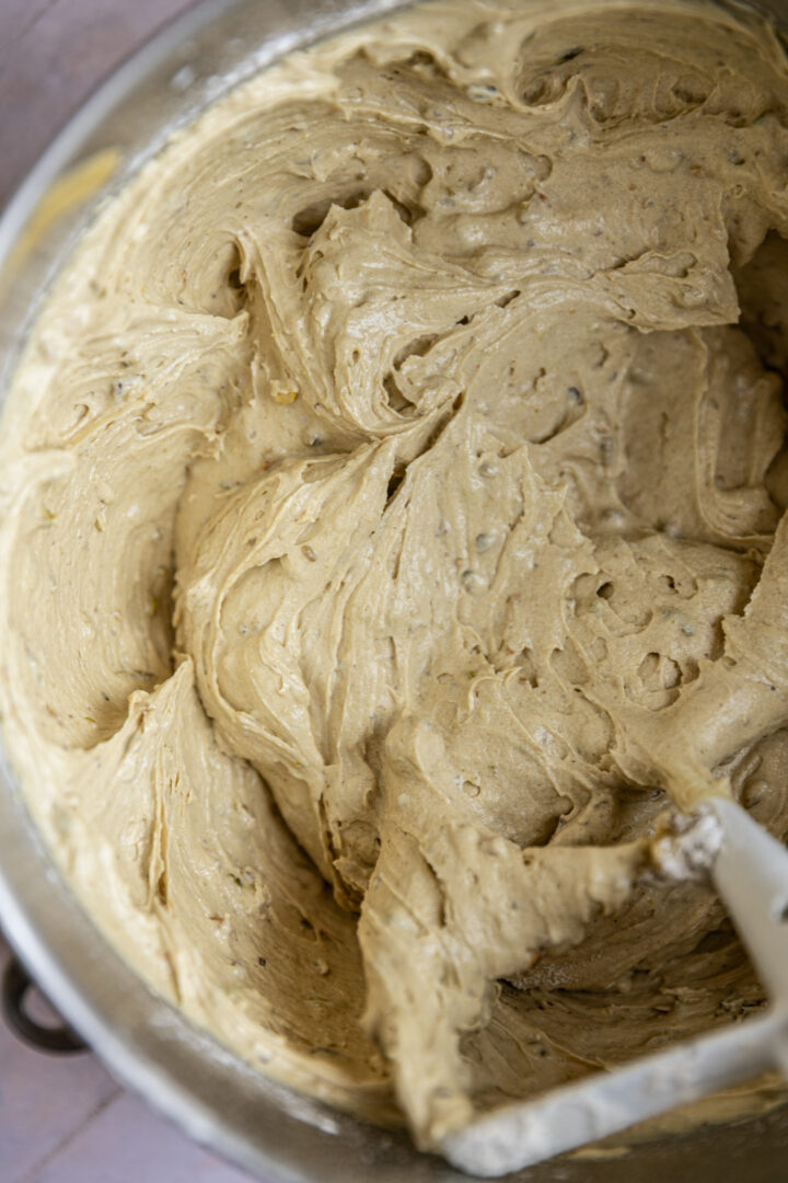 Batter for a pistachio bundt cake.