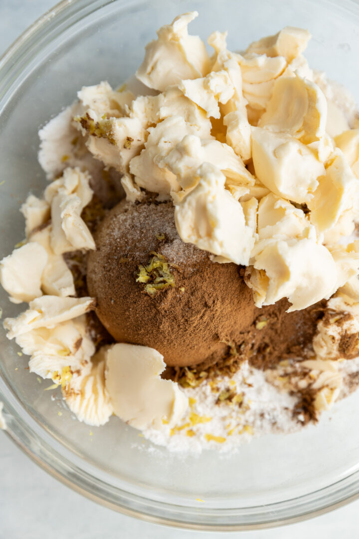 Ingredients for a crumb topping in a glass bowl.